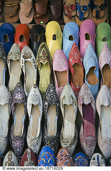 Many colorful leather ladies shoes for sale.