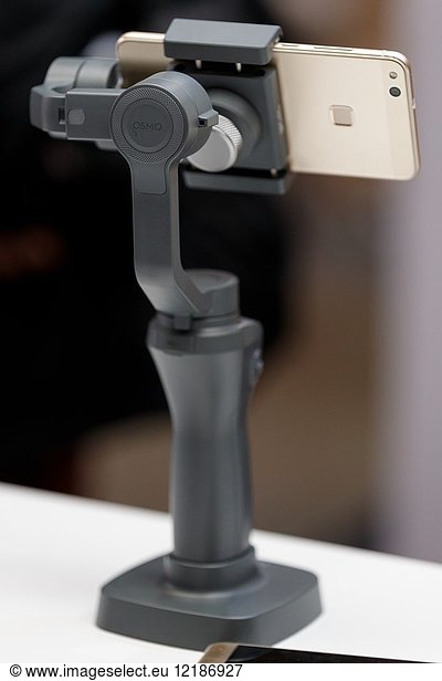 March 3  2018  Yokohama  Japan - The new DJI OSMO MOBILE 2 on display at the CP+ Camera & Photo Imaging Show 2018 in Pacifico Yokohama. Japan's largest camera and photo imaging exhibition bring together 1 123 exhibitor booths during the four-day trade show at the Pacifico Yokohama and OSANBASHI Hall. Organizers expect approximately 70 000 visitors until March 4th.