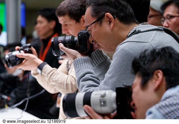 March 3  2018  Yokohama  Japan - Visitors try out the new camera Sony a7 III at the CP+ Camera & Photo Imaging Show 2018 in Pacifico Yokohama. Japan's largest camera and photo imaging exhibition bring together 1 123 exhibitor booths during the four-day trade show at the Pacifico Yokohama and OSANBASHI Hall. Organizers expect approximately 70 000 visitors until March 4th.
