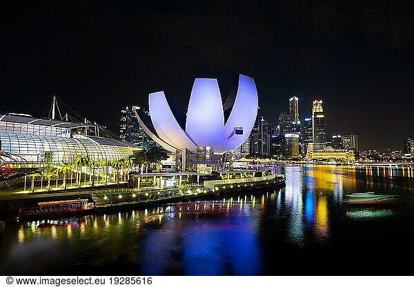 Marina Bay  Singapore  November 24th 2019: City skyline with ArtScience museum in the foreground at night  Asia