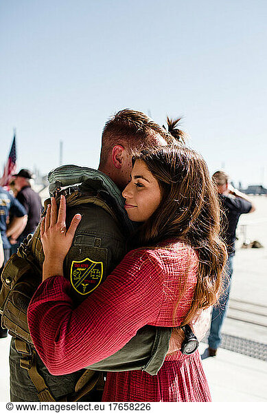 Marine Reunited & Hugging Wife at Miramar in San Diego