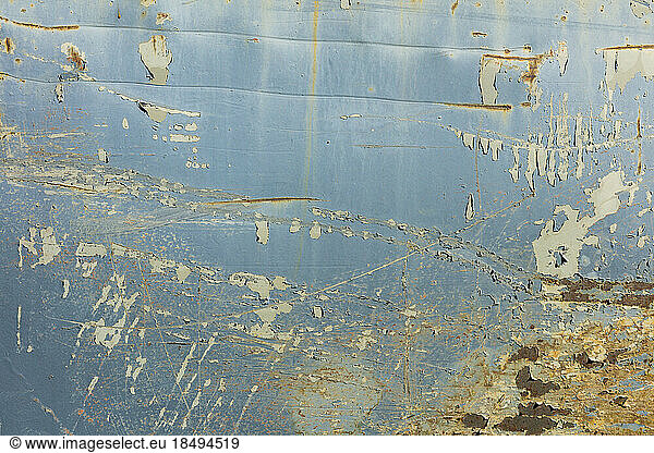 Marks and rust patterns on metal containers  close up.