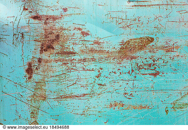 Marks and rust patterns on metal containers  close up.