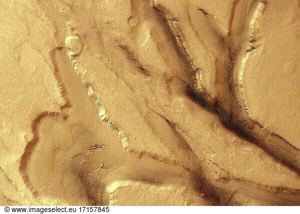 MARS Tempe Terra -- 2004 -- Gräben in Tempe Terra  einer geologisch komplexen Region  die Teil des alten Marshochlands ist. Gräben sind vertiefte Landblöcke  die von parallelen Verwerfungen begrenzt werden und tektonischen Ursprungs sind. Die Täler und Gräben sind 5 bis 10 Kilometer breit und bis zu 1500 Meter tief. Entlang der Grabenflanken ist die Schichtung des Grundgesteins offenkundig. Tektonische Prozesse haben zur Entstehung dieser Gräben geführt. Nach der tektonischen Aktivität haben andere Prozesse die Landschaft neu geformt. In der Szene sind die Ergebnisse von Verwitterung und Massentransport zu sehen. Durch diese Prozesse wurde die Oberfläche geglättet  so dass ehemals scharfe Kanten nun abgerundet erscheinen. Die Tempe-Terra-Region des Mars weist eine komplexe geologische Geschichte auf. Das Bild wurde unmittelbar westlich des Barabashov-Kraters aufgenommen und zeigt die Übergangszone zwischen dem alten Marshochland im Süden und dem geologisch jüngeren nördlichen Tiefland -- Bild von Lightroom Photos / ESA.