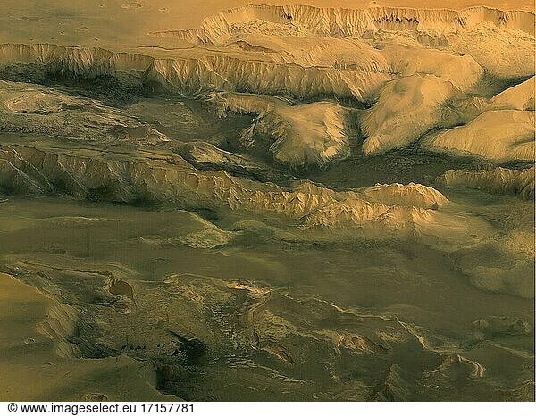 MARS Valles Marineris -- Apr / Mai 2004 -- Dieses perspektivische Bild  das von der hochauflösenden Stereokamera (HRSC) an Bord der ESA-Sonde Mars Express aufgenommen wurde  zeigt den zentralen Teil der 4000 Kilometer langen Valles Marineris-Schlucht auf dem Mars. Die HRSC nahm dieses Bild während der Umlaufbahnen 334 und 360 am 24. April bzw. 2. Mai 2004 auf  mit einer Auflösung von etwa 21 Metern pro Pixel bei der ersten und 30 Metern pro Pixel bei der zweiten Umlaufbahn. Die perspektivische Ansicht blickt von einem imaginären Punkt über dem angrenzenden Hochland in Richtung Norden in das Zentrum der Valles Marineris. Das Haupttal der Valles Marineris mit dem Namen Melas Chasma (lateinisch für dunkle Kluft ) liegt dem Beobachter am nächsten  gefolgt von Candor Chasma (der hellen Kluft ) und Ophir Chasma  die dem Horizont am nächsten sind. Jedes Tal ist etwa 200 Kilometer breit und zwischen 5000 und 7000 Meter tief. Das Bild befindet sich zwischen 3? bis 13? Süd  und 284? bis 289? Osten. Norden ist oben - Bild von Lightroom Photos / ESA.