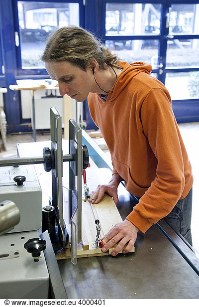 Master carpenter apprentice using a milling machine  Master Craftman School of the Chamber of Small Industries and Skilled Trades for carpentry  Dusseldorf  North Rhine-Westphalia  Germany  Europe