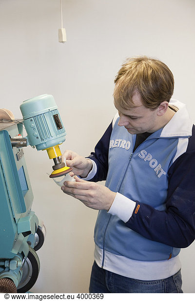 Master Craftman student during the training using a grinder  Master course for orthopedic shoemakers  Master Craftman School of the Chamber of Small Industries and Skilled Trades  Dusseldorf  North Rhine-Westphalia  Germany  Europe