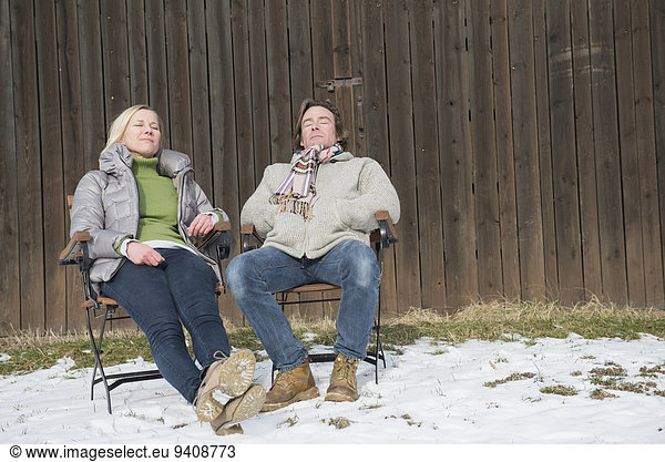 Mature couple relaxing  smiling