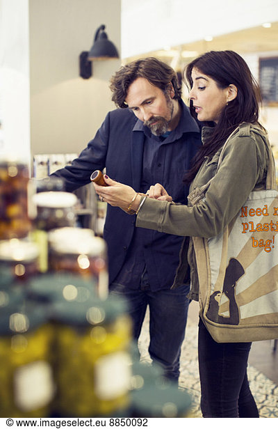 Mature couple shopping in supermarket