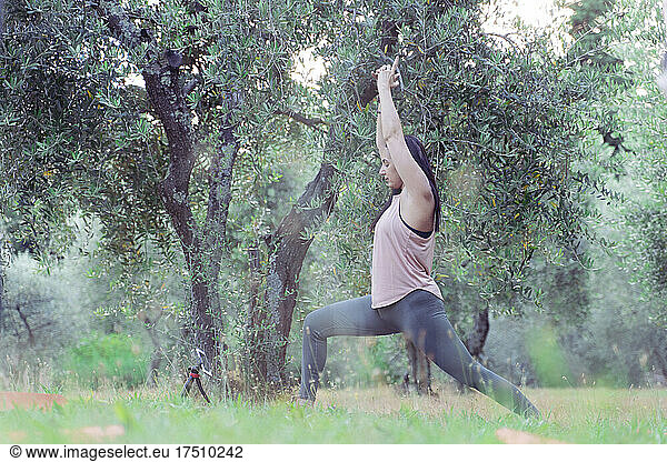 Mature woman during yoga in park