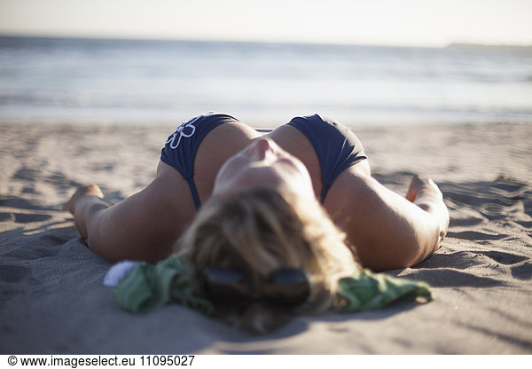 Mature woman resting on the beach  Viana do Castelo  Norte Region  Portugal