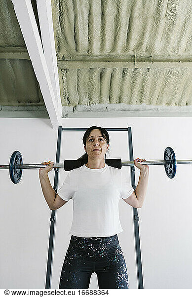 Mature woman training at gym