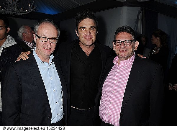 Max Hole  Chairman & CEO of Universal Music Group International  Robbie Williams and Lucian Grainge  Chairman & CEO of Universal Music Group attend the Universal Music Group Chairman & CEO Lucian Grainge's annual Grammy Awards viewing party on February 10  2013 in Brentwood  California.