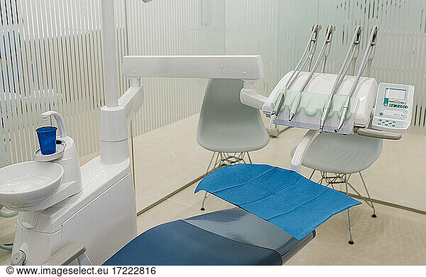 Medical equipment with dentist's chair in clinic