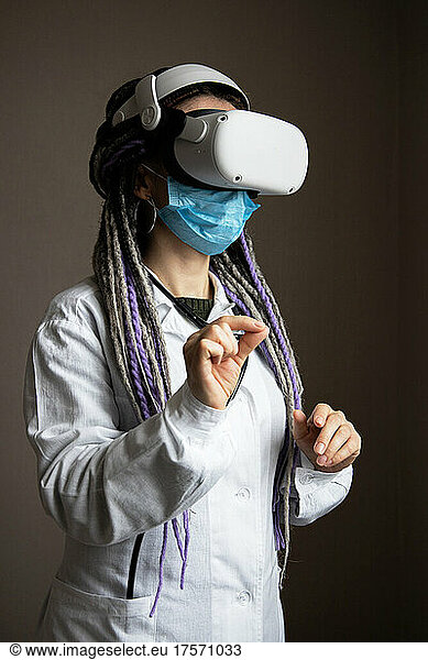 Medical worker is using virtual reality helmet