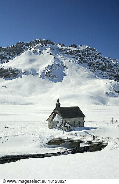 Melchsee-Frutt  chapel and frozen Melchsee  skiing area in the Swiss Alps  Canton Obwalden  Switzerland  Europe