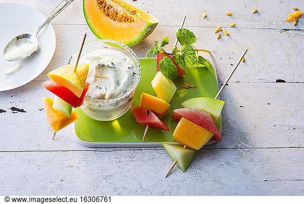 Melon skewers with sour cream
