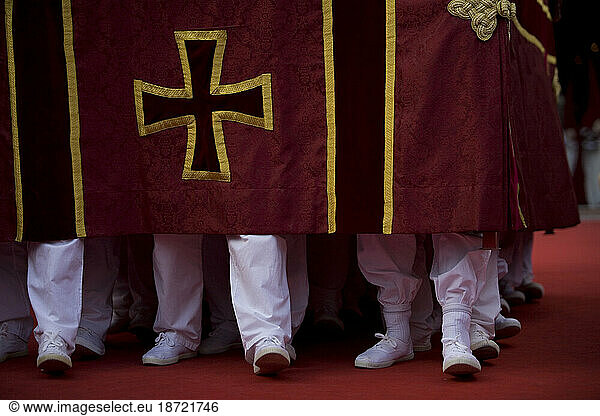 Men carry a throne with a statue of San Antonio or Sain Anthony during Easter Holy Week celebrations in Espera village  Cadiz province  Andalusia  Spain.