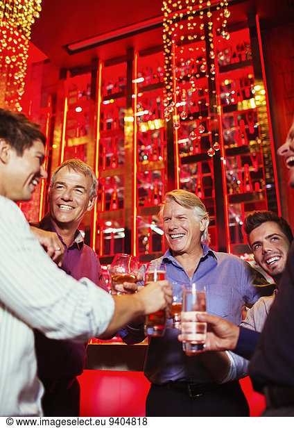Men enjoying themselves at party