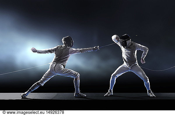 Men fencing
