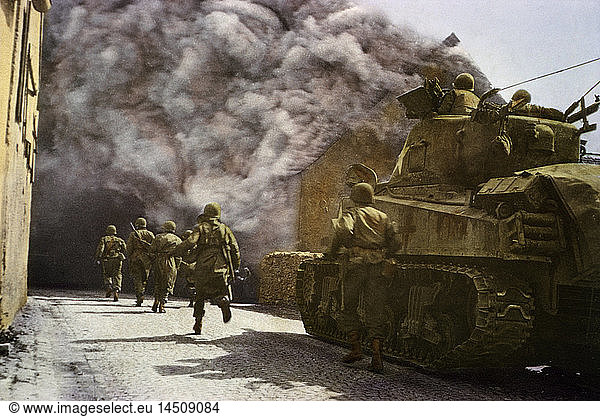 Men of Armored Division Running Through Smoke-Filled Street of German Town  Central Europe Campaign  Western Allied Invasion of Germany  1945