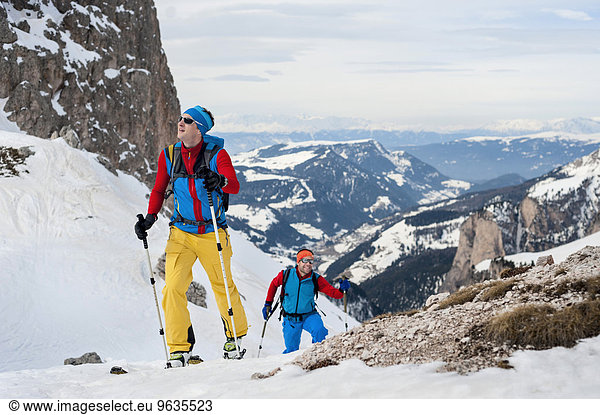 Men on a ski tour