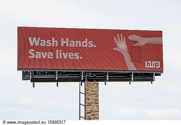 Message on a billboard relating to the coronavirus to wash your hands and save lives  Mounds View  Minnesota.