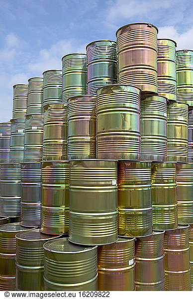 Metal barrels piled up