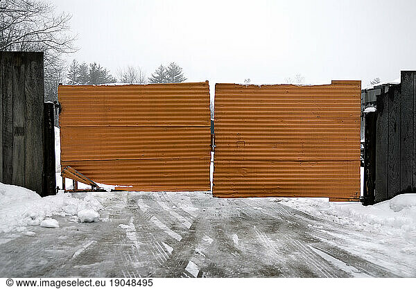 Metal orange fence  Cumberland  Maine.