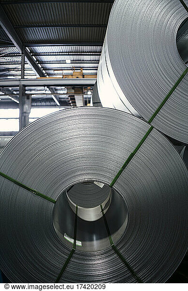Metal sheet rolls at steel mill