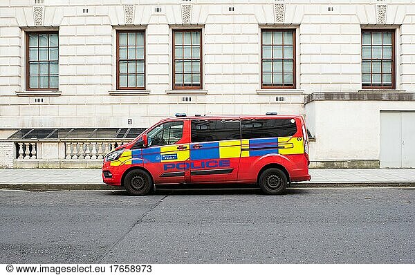 Metropolitan police van parked outside government building London