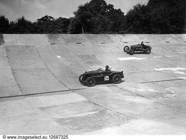 MG C type and Amilcar C6 racing on the banking at Brooklands. Artist: Bill Brunell.