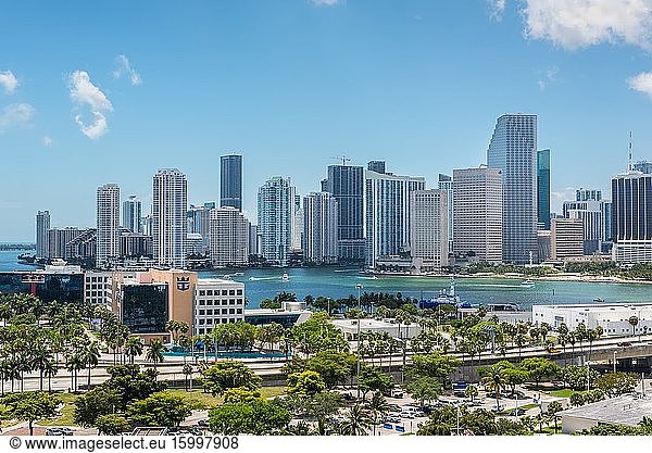 Miami  FL  United States - April 27  2019: Downtown of Miami Skyline with amazing architecture viewed from Dodge Island with Cruise terminal at Biscayne Bay in Miami  Florida  USA.