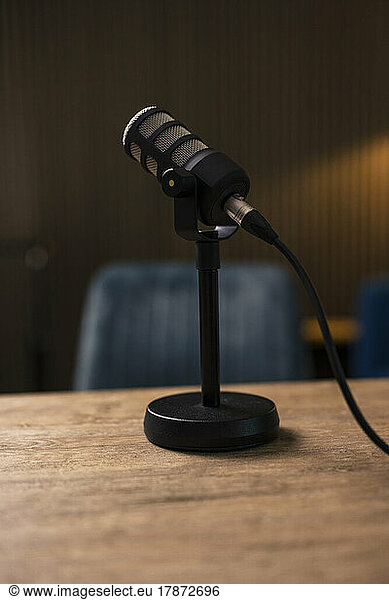 Microphone on desk in recording studio