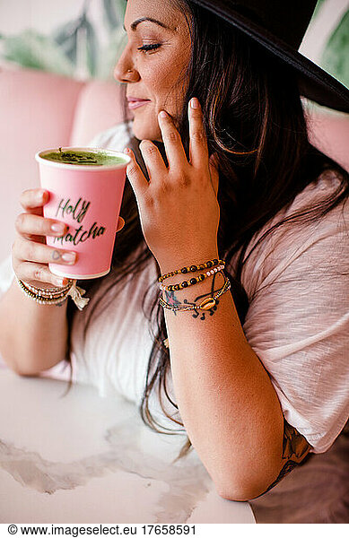 Mid 30's Hispanic Woman Modeling Jewelry & Clothing in San Diego