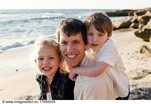 Mid Thirties Dad & Young Kids on Beach in San Diego