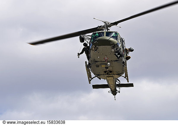 Military helicopter carrying out a medevac