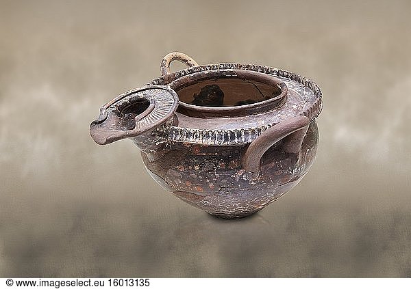 Minoan luxury 'teapot' with elaborate spout from Phaistos Palace 1800-1600 BC  Heraklion Archaeological Museum.This style of pottery is named afetr Kamares cave where this style of pottery was first found.