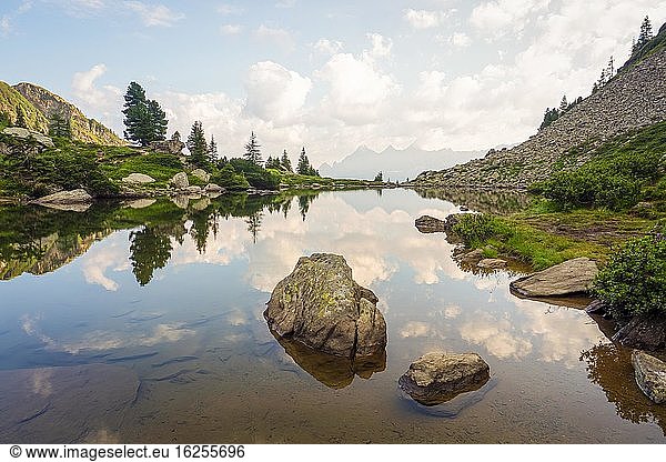 Mirror lake at first light with the Hoher Dachstein in the background  Reiteralm  Styria  Austria  Europe