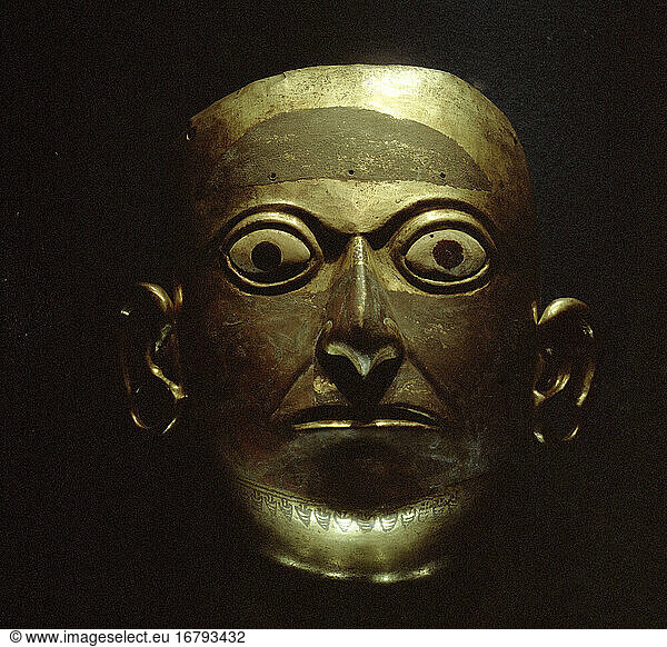 Moche civilization flourished in northern Peru  100 - 600 AD. Mask of a God King. Gold  height 24 cm.
Stuttgart  Linden-Museum.