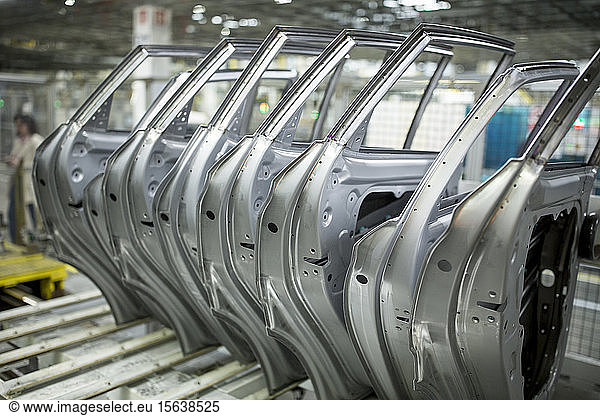 Modern automatized car production in a factory  row of car doors