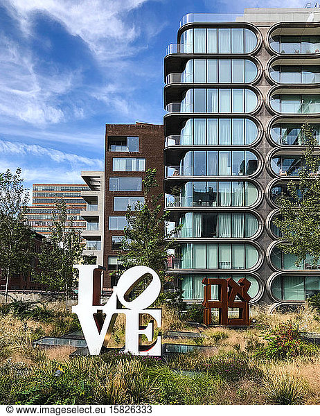 Modern building and Love sign in New York City  New York  USA.