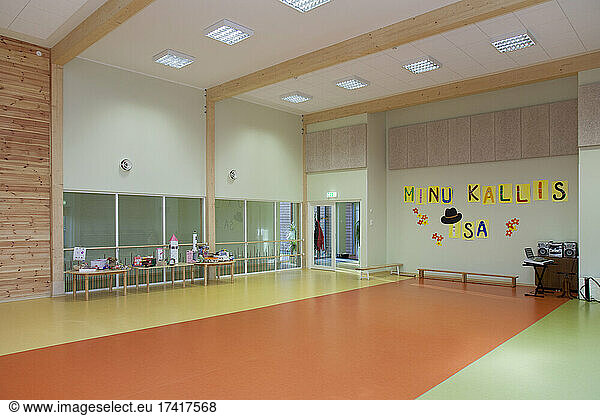 Modern children's day care or pre-school building  open indoors play area