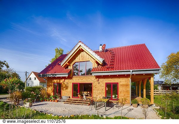 Modern log house made of larch with terrace  Wustermark  Brandenburg  Germany  Europe