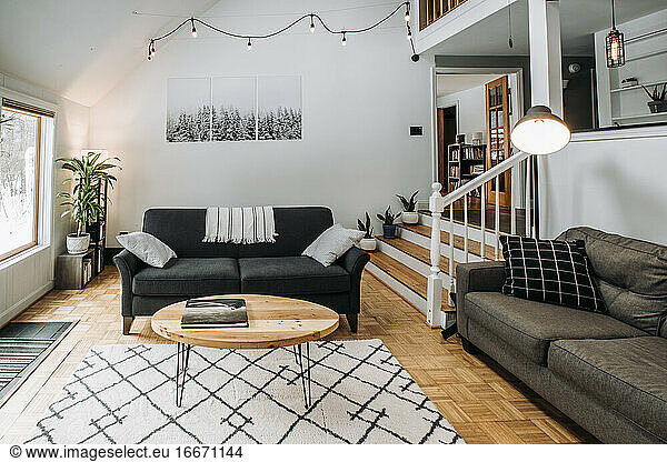 modern scandinavian living room interior with couch and lighting