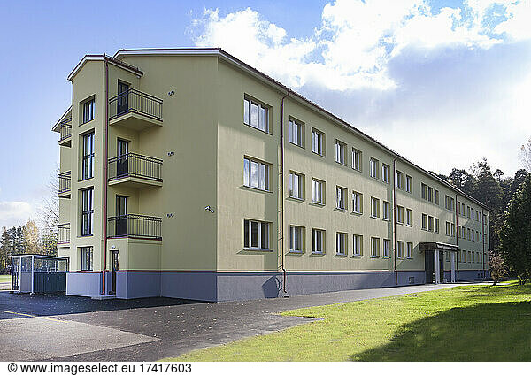 Modern youth hostel building  accommodation for travellers  building exterior.