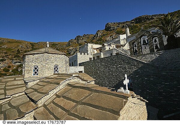 Moni Panachrantou  Stone Church Building  Stone Church Tower  Bell Tower  Fortress-like  Rock Monastery  Blue Cloudless Sky  Andros Island  Cyclades  Greece  Europe