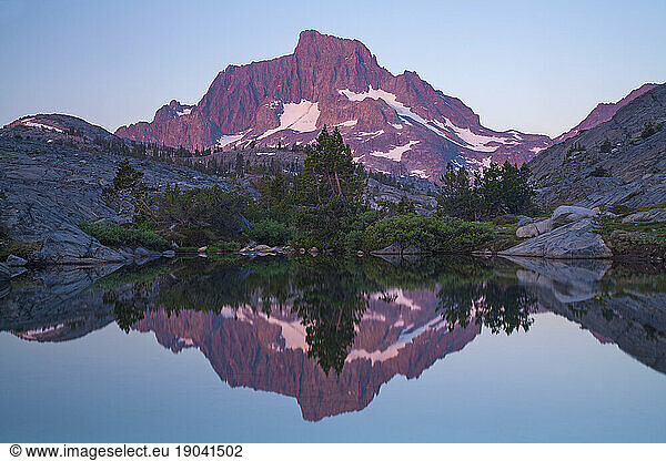 Morning light illuminates Mount Ritter located in the Sierra Nevada mountain range in California.
