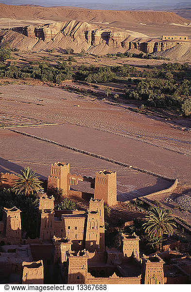 MOROCCO Ait Benhaddou Kasbah and hill town used in films such as Jesus of Nazareth and Lawrence of Arabia. Looking down on sandstone buildings and surrounding landscape.