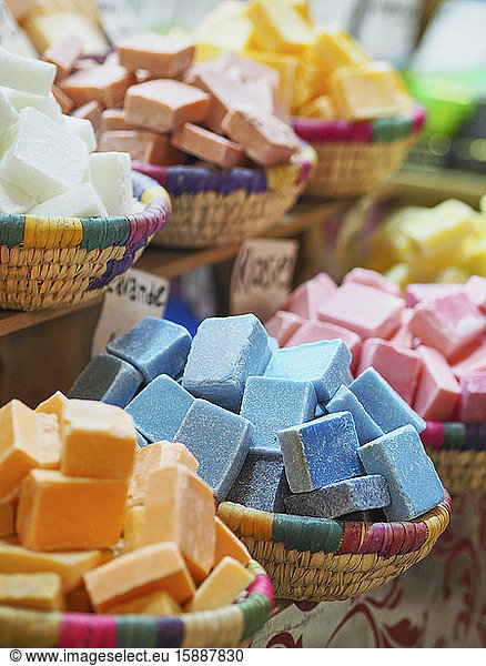 Morocco  Baskets of colorful soaps sold at market